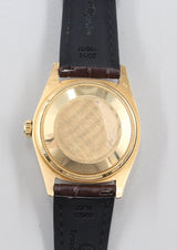 Rolex - Pre-owned Yellow Gold Day-Date 36 Single Quickset White Roman Dial Leather Strap 18038