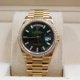 Rolex - Unworn Yellow Gold Day-Date 36 Green Baguette Dial Diamond Bezel 128348RBR