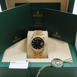 Rolex - Unworn Yellow Gold Day-Date 36 Green Baguette Dial Diamond Bezel 128348RBR