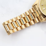 Rolex - Pre-owned Yellow Gold Day-Date 36 Single Quickset Champagne Diamond Dial 18038
