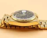 Rolex - Pre-owned Yellow Gold Day-Date Oysterquartz Black Dial 19018