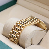 Rolex - Unworn Yellow Gold Day-Date 36 Green Baguette Dial Diamond Bezel 128348RBR