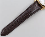 Rolex - Pre-owned Yellow Gold Day-Date 36 Single Quickset White Roman Dial Leather Strap 18038