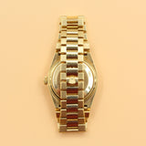 Rolex - Pre-owned Yellow Gold Day-Date Oysterquartz Black Dial 19018