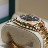 Rolex - Unworn Yellow Gold Day-Date 36 Green Baguette Dial Diamond Bezel 128348RBR