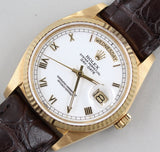 Rolex - Pre-owned Yellow Gold Day-Date 36 Single Quickset White Roman Dial Leather Strap 18038