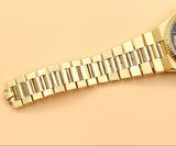 Rolex - Pre-owned Yellow Gold Day-Date Oysterquartz Black Dial 19018