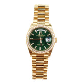 Rolex - Unworn Yellow Gold Day-Date 36 Green Baguette Dial Diamond Bezel 128348RBR