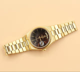 Rolex - Pre-owned Yellow Gold Day-Date Oysterquartz Black Dial 19018