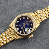 Rolex - Pre-owned Yellow Gold Lady-Datejust 26mm Blue Vignette Diamond Dial 69178