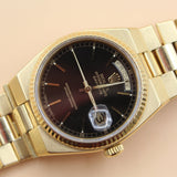 Rolex - Pre-owned Yellow Gold Day-Date Oysterquartz Black Dial 19018