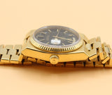 Rolex - Pre-owned Yellow Gold Day-Date Oysterquartz Black Dial 19018