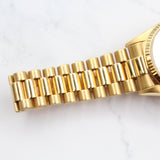 Rolex - Pre-owned Yellow Gold Day-Date 36 Single Quickset Champagne Diamond Dial 18038