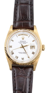 Rolex - Pre-owned Yellow Gold Day-Date 36 Single Quickset White Roman Dial Leather Strap 18038