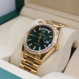 Rolex - Unworn Yellow Gold Day-Date 36 Green Baguette Dial Diamond Bezel 128348RBR
