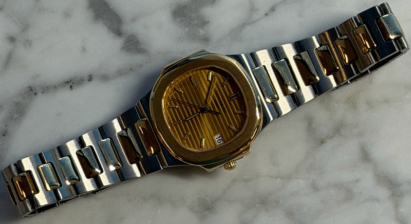 Patek Philippe - Pre-owned Two Tone Yellow Gold Nautilus 33mm Champagne Dial 3900