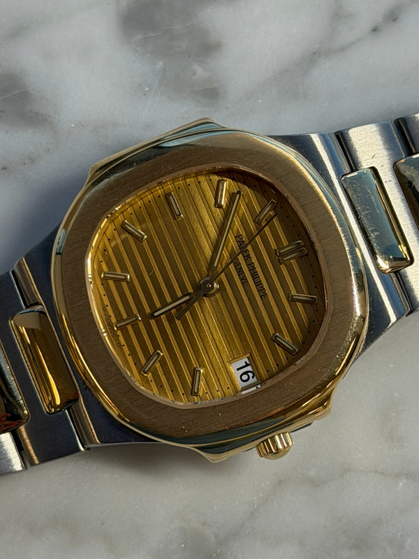 Patek Philippe - Pre-owned Two Tone Yellow Gold Nautilus 33mm Champagne Dial 3900