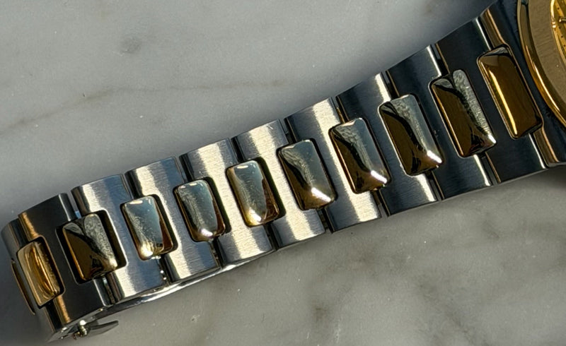 Patek Philippe - Pre-owned Two Tone Yellow Gold Nautilus 33mm Champagne Dial 3900