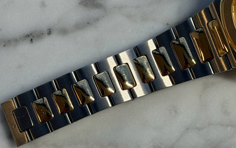 Patek Philippe - Pre-owned Two Tone Yellow Gold Nautilus 33mm Champagne Dial 3900