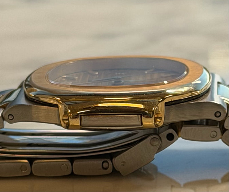 Patek Philippe - Pre-owned Two Tone Yellow Gold Nautilus 33mm Champagne Dial 3900