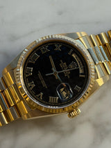 Rolex - Pre-owned Yellow Gold Day-Date 36 Single Quick Black Pyramid Dial Arabic Day and Date Wheel 18038