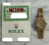 Rolex - Pre-owned Yellow Gold Lady-Datejust 26mm Presidential Diamond & Ruby Dial Diamond Bezel & Lugs 69158
