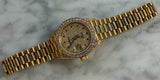 Rolex - Pre-owned Yellow Gold Lady-Datejust 26mm Presidential Diamond & Ruby Dial Diamond Bezel & Lugs 69158
