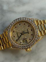 Rolex - Pre-owned Yellow Gold Lady-Datejust 26mm Presidential Diamond & Ruby Dial Diamond Bezel & Lugs 69158
