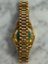 Rolex - Pre-owned Yellow Gold Lady-Datejust 26mm Presidential Diamond & Ruby Dial Diamond Bezel & Lugs 69158