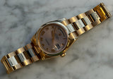 Rolex - Pre-owned Rose Gold Day-Date 36 Pink Roman Dial 118205