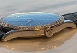 Patek Philippe - Pre-owned White Gold Calatrava 33mm Blue Dial Diamond Bezel 4896G