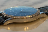 Patek Philippe - Pre-owned White Gold Calatrava 33mm Blue Dial Diamond Bezel 4896G