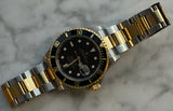 Rolex - Pre-owned Two Tone Yellow Gold Submariner Black Dial 16613