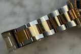Rolex - Pre-owned Two Tone Yellow Gold Submariner Black Dial 16613