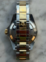 Rolex - Pre-owned Two Tone Yellow Gold Submariner Black Dial 16613