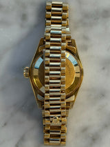 Rolex - Pre-owned Yellow Gold Lady-Datejust 26mm Champagne Ruby Diamond Dial 69178