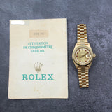 Rolex - Pre-owned 26mm Yellow Gold Lady Datejust 26 Champagne Ruby and Diamond Dial 69178