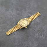 Rolex - Pre-owned 26mm Yellow Gold Lady Datejust 26 Champagne Ruby and Diamond Dial 69178
