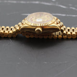 Rolex - Pre-owned 26mm Yellow Gold Lady Datejust 26 Champagne Ruby and Diamond Dial 69178