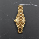 Rolex - Pre-owned 26mm Yellow Gold Lady Datejust 26 Champagne Ruby and Diamond Dial 69178