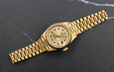 Rolex - Pre-owned 26mm Yellow Gold Lady Datejust 26 Champagne Ruby and Diamond Dial 69178