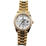 Rolex - Unworn Yellow Gold Day Date 40 Mother of Pearl Diamond Baguette Dial 228398TBR