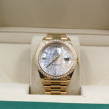 Rolex - Unworn Yellow Gold Day Date 40 Mother of Pearl Diamond Baguette Dial 228398TBR