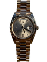 Rolex - Pre-owned Rose Gold Day-Date 40 Presidential Sundust Baguette Dial 228235