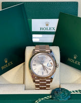 Rolex - Pre-owned Rose Gold Day-Date 40 Presidential Sundust Baguette Dial 228235