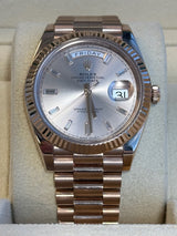 Rolex - Pre-owned Rose Gold Day-Date 40 Presidential Sundust Baguette Dial 228235