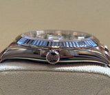 Rolex - Pre-owned Rose Gold Day-Date 40 Presidential Sundust Baguette Dial 228235