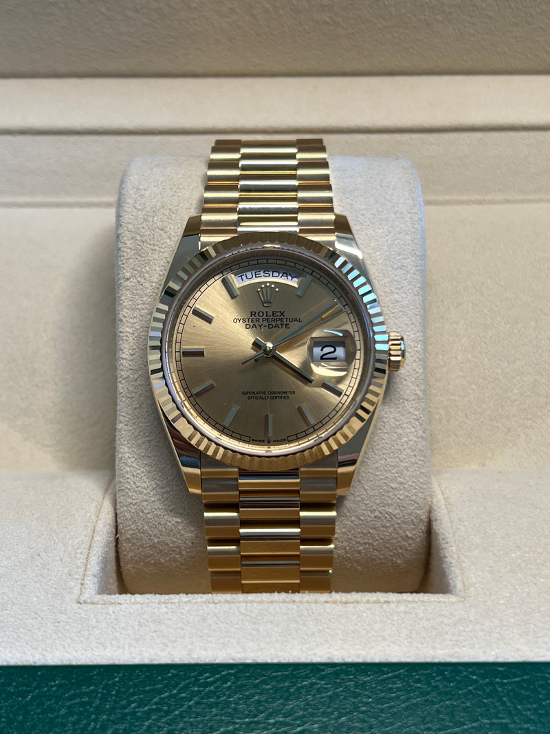 Rolex - Pre-owned Yellow Gold Day-Date Presidential Champagne Dial 128238