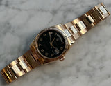 Rolex - Pre-owned Rose Gold Day-Date 36 Black Arabic Dial 118235