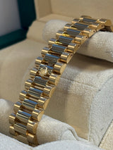 Rolex - Pre-owned Yellow Gold Day-Date 40 Presidential Champagne Index Dial 228238